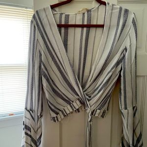 White top with blue stripes with flare sleeves